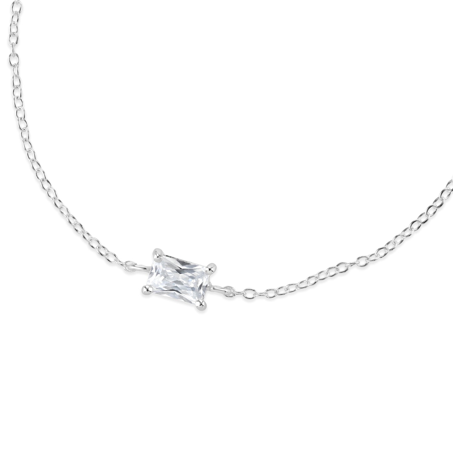 Silver dainty cable chain with baguette cut cubic zirconia pendant.