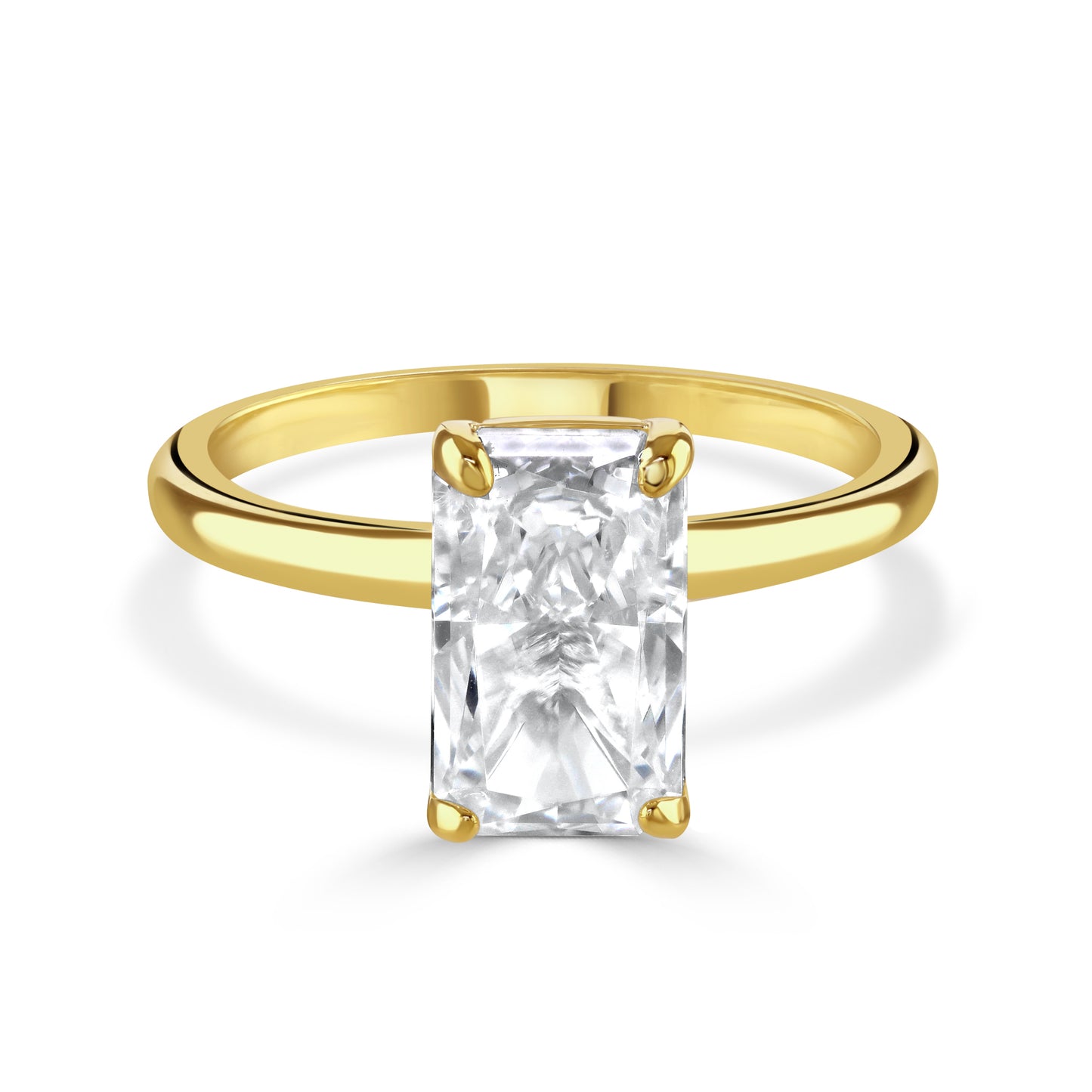 Ring with sparkling baguette cut cubic zirconia gemstone on a gold band.