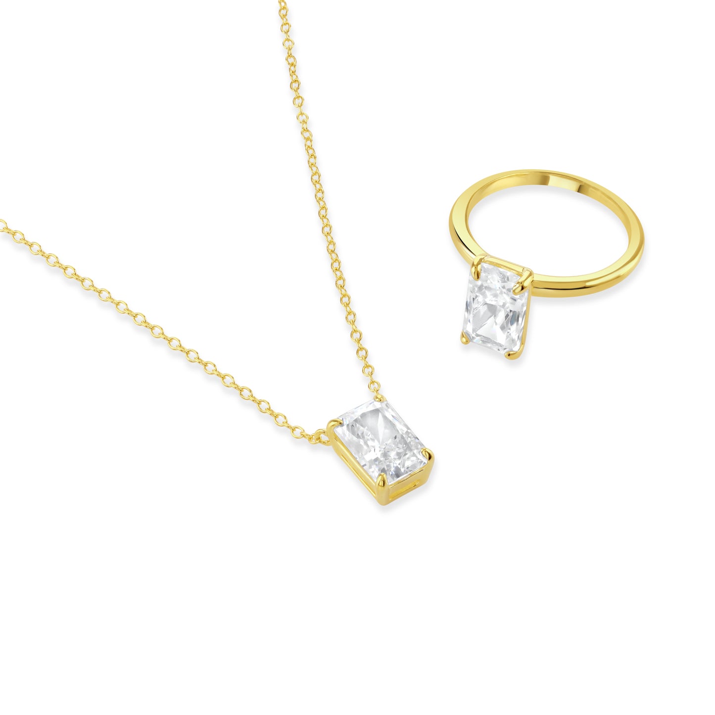 Gold necklace and matching gold ring both with a sparkling clear baguette cut cubic zirconia gemstone.