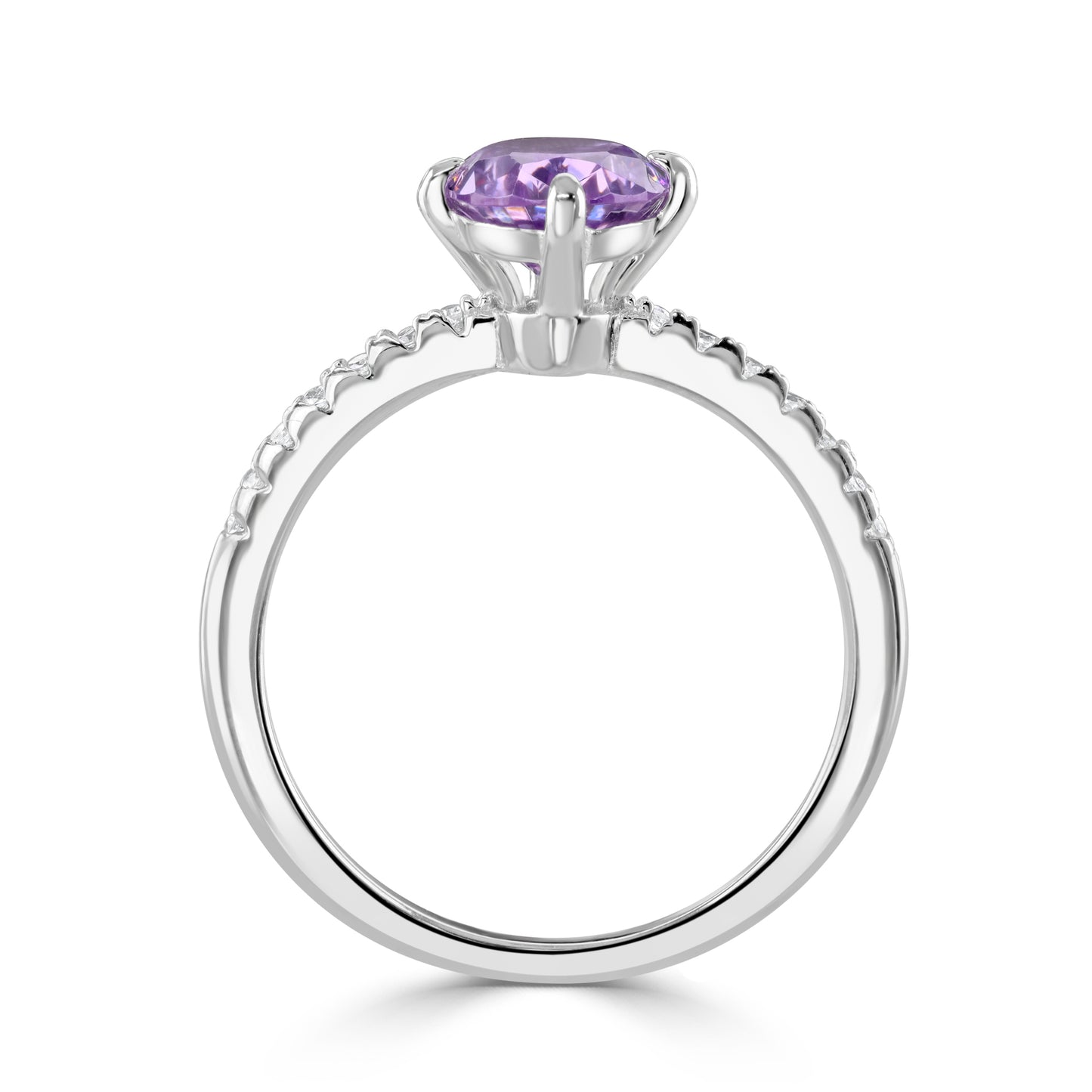 Silver ring displayed standing, with prongs securing a purple cubic zirconia and detailed shank design.