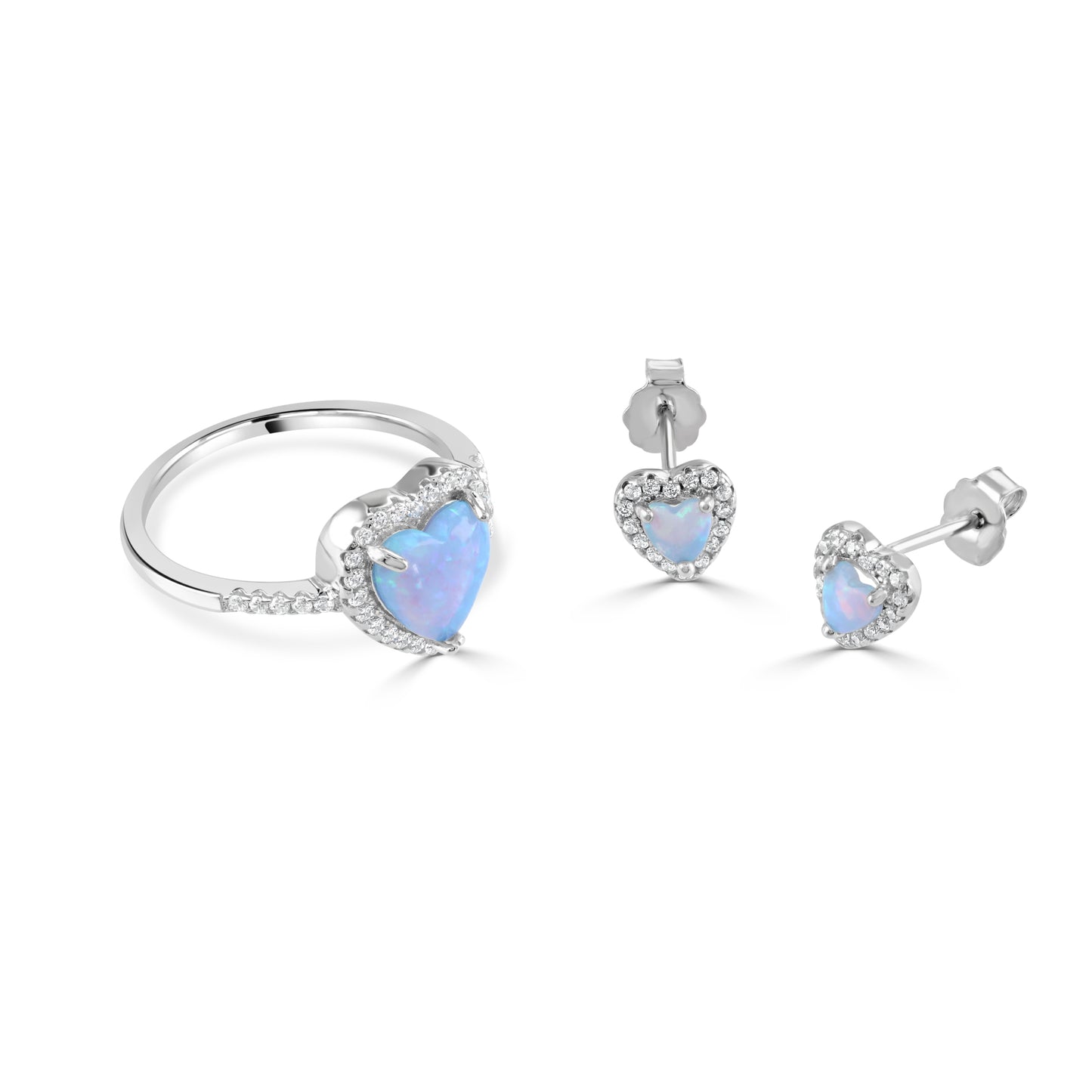 Sterling silver heart shaped ring with matching silver earrings, containing blue synthetic opals and cubic zirconia gemstones.