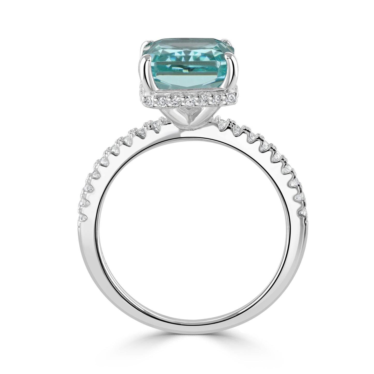 Flashy cocktail ring with vibrant turquoise head and surrounding cubic zirconia on prongs and top band.