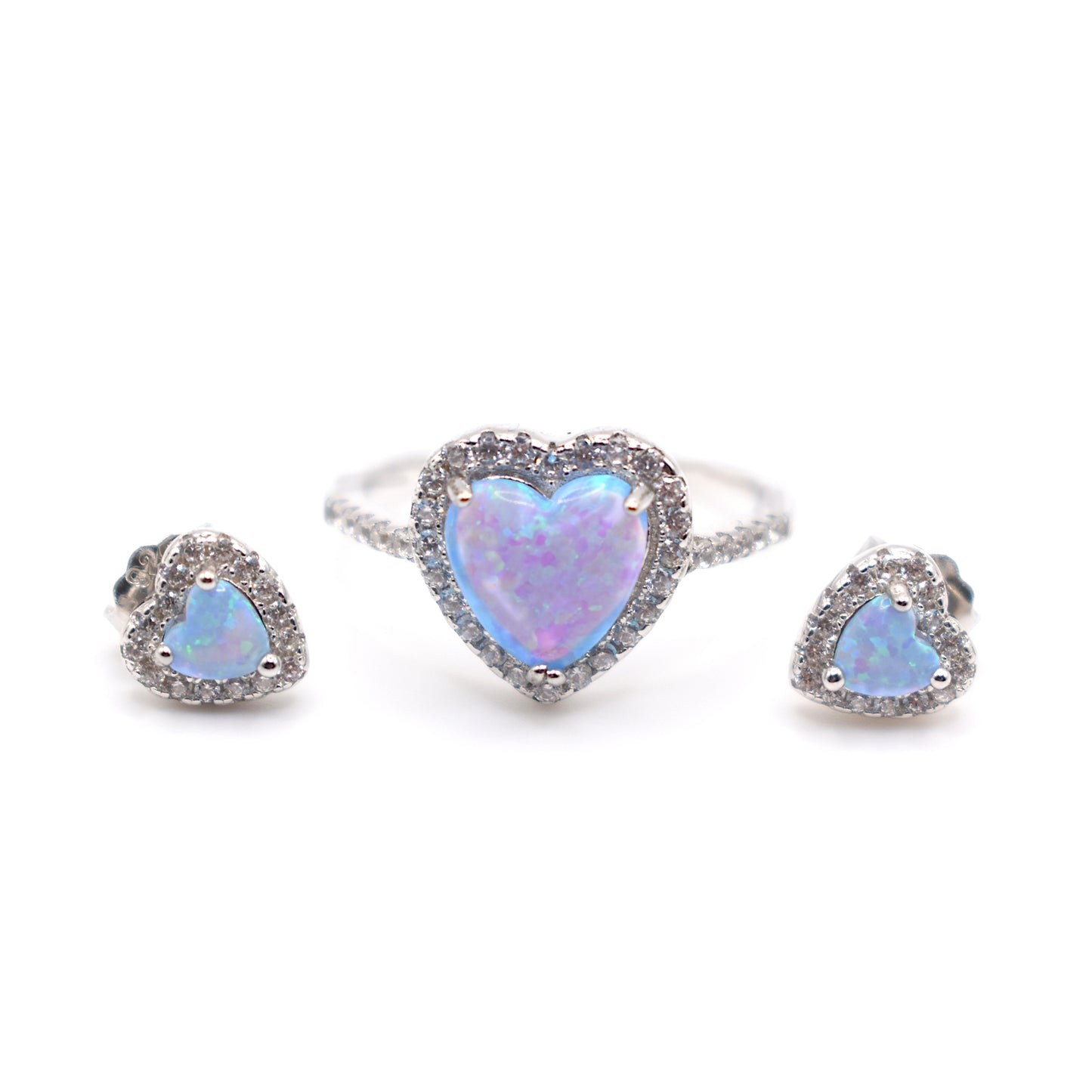 Blue synthetic opal love heart surrounded by cubic zirconia gemstones earring and ring matching set. Made from Sterling silver, this set would make the perfect gift for a loved one. 